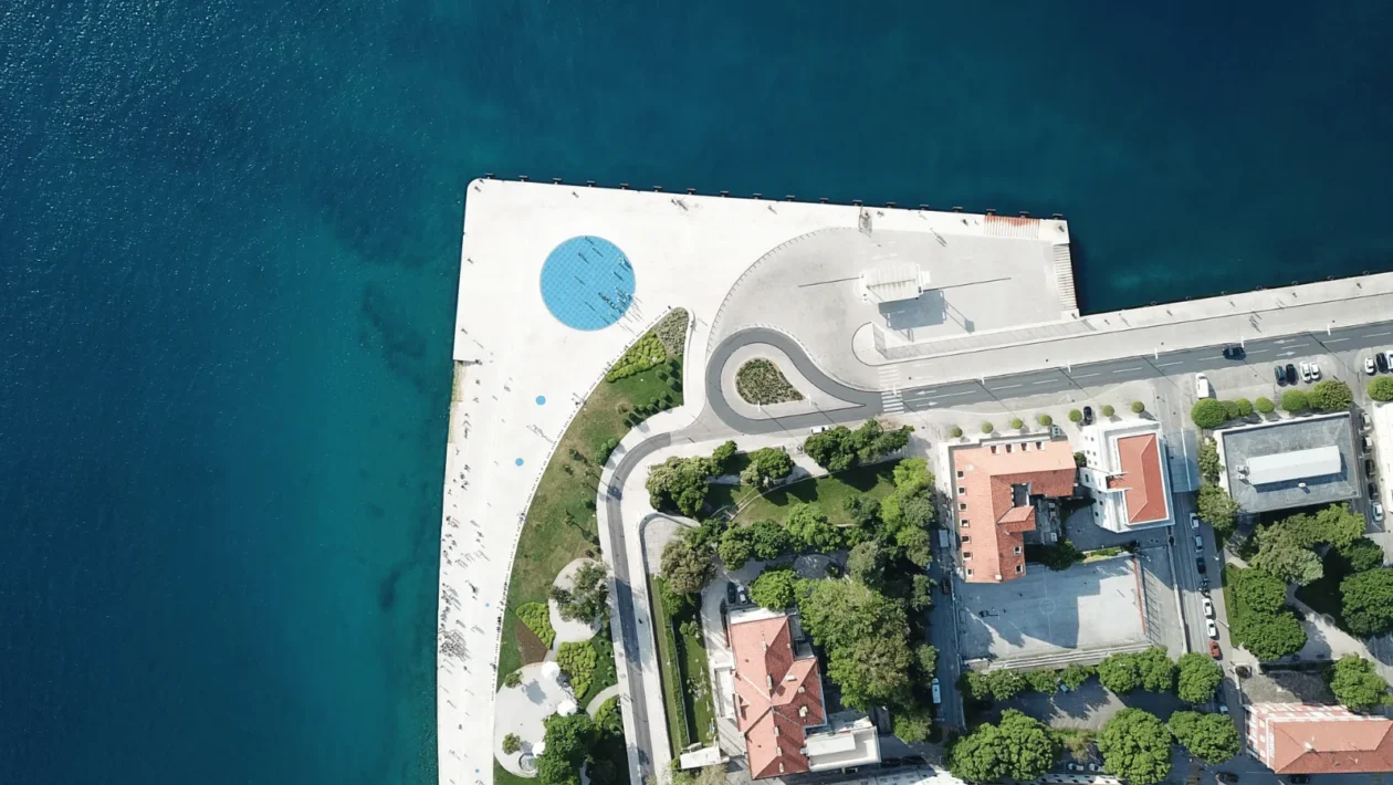 Greeting to the Sun Zadar 22-meter glass circle embedded in waterfront stone pavement during daytime