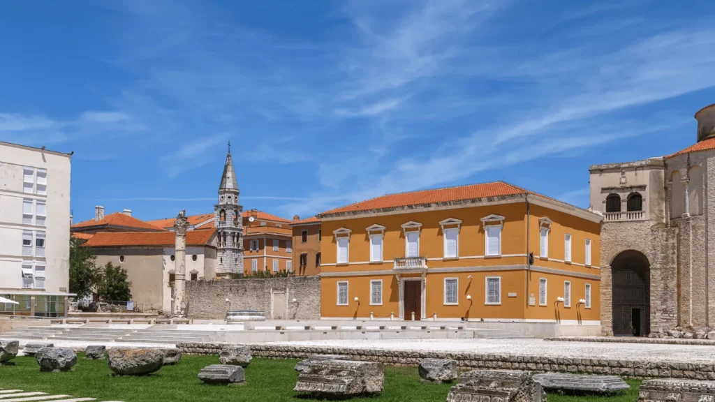 Close view of Roman Forum Zadar ruins, showing preserved Roman stone blocks surrounded by the historic urban setting.