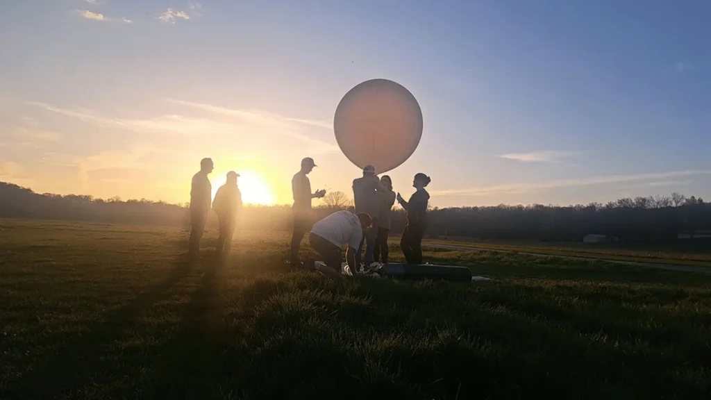 A student team from the University of Kentucky prepares to launch a ballon from Bloomington, Indiana, to take atmospheric measurements on April 8, 2024, during the 2024 Nationwide Eclipse Ballooning Project campaign.